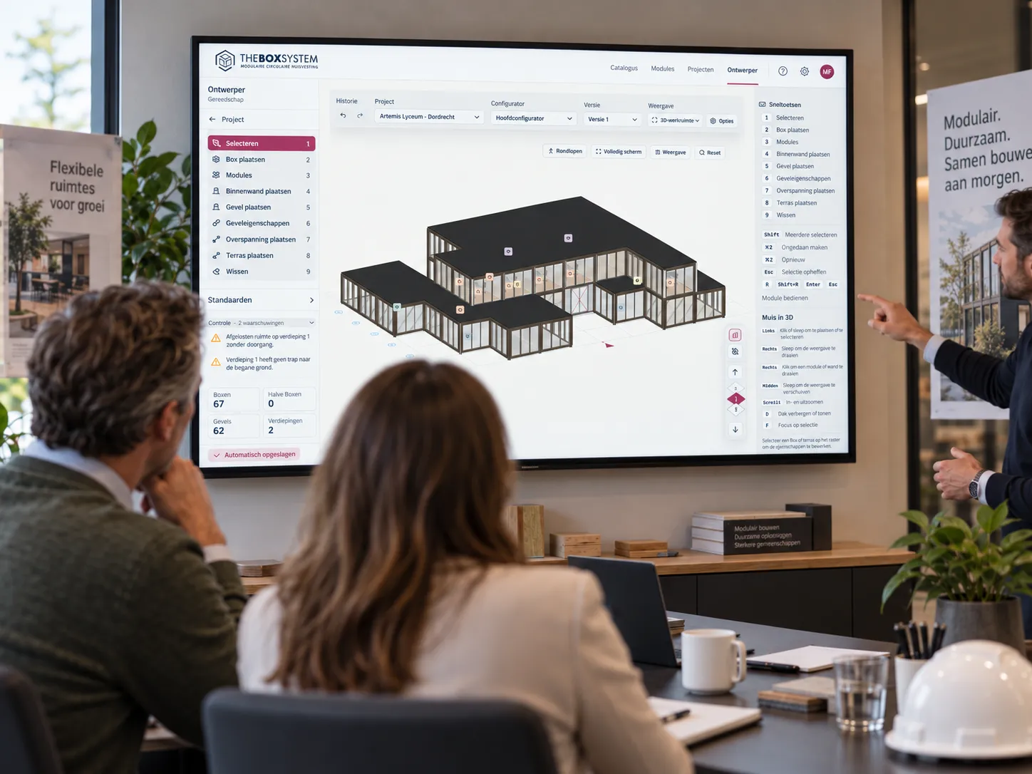 The team discussing a school design in the 3D designer
